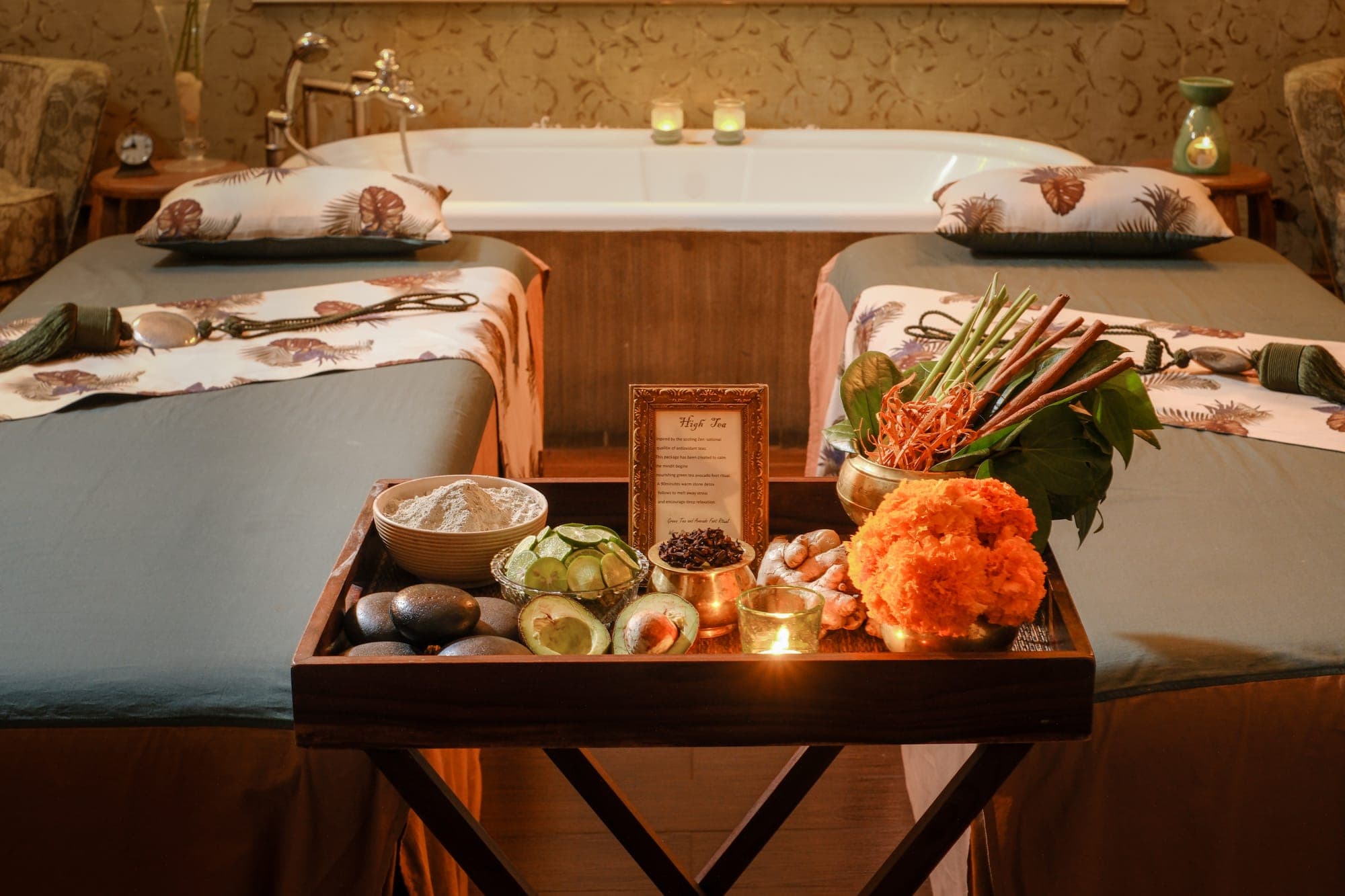 A candlelit tray of treatment ingredients
