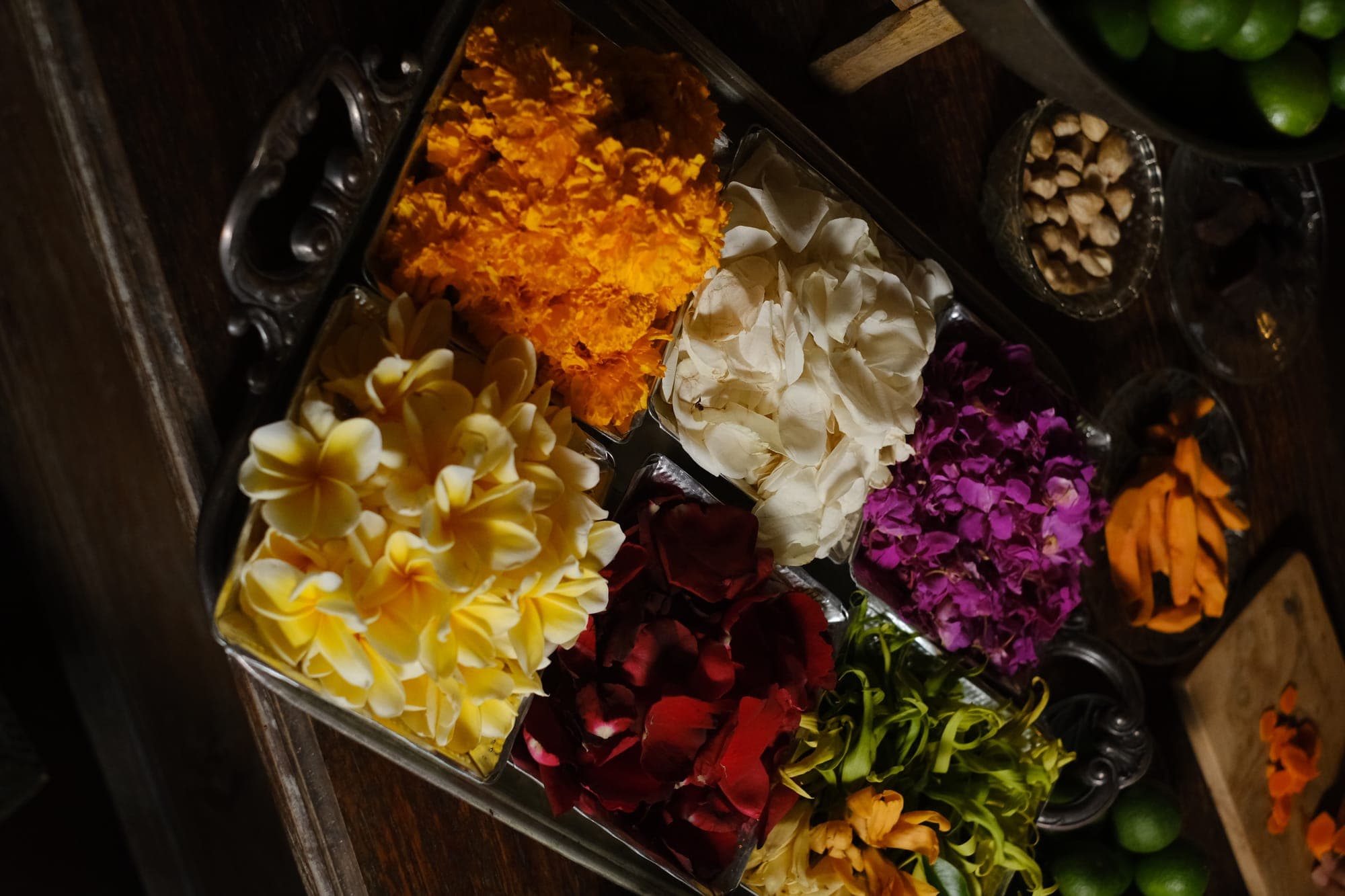 A tray of fresh flowers for a treatment