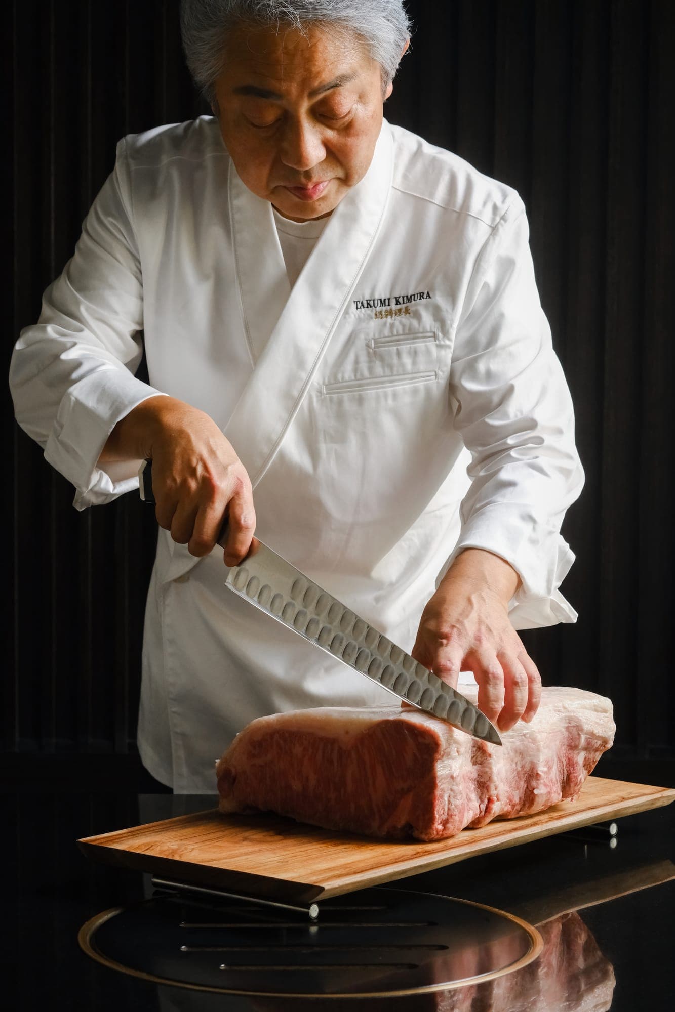The chef slicing a wagyu loin