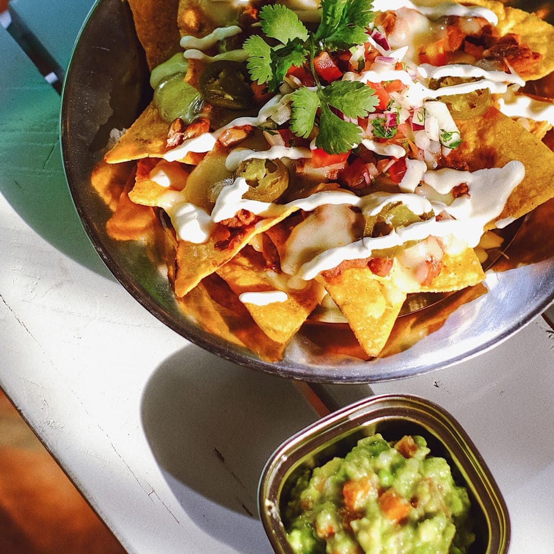 Loaded nachos with guacamole