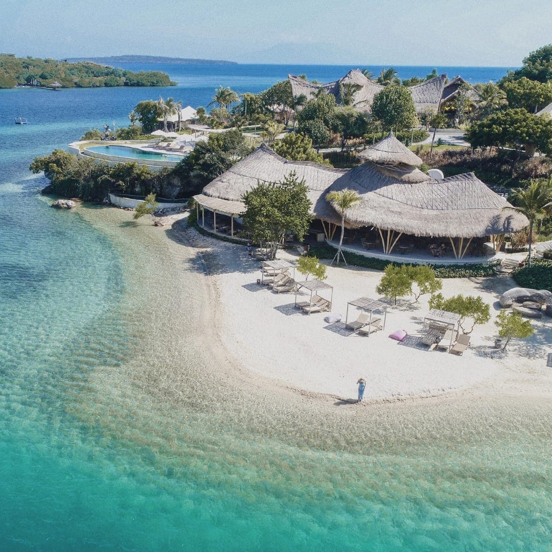 A white-sand beach and resort from the air